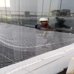 Commercial bird control services by bird netting installation
